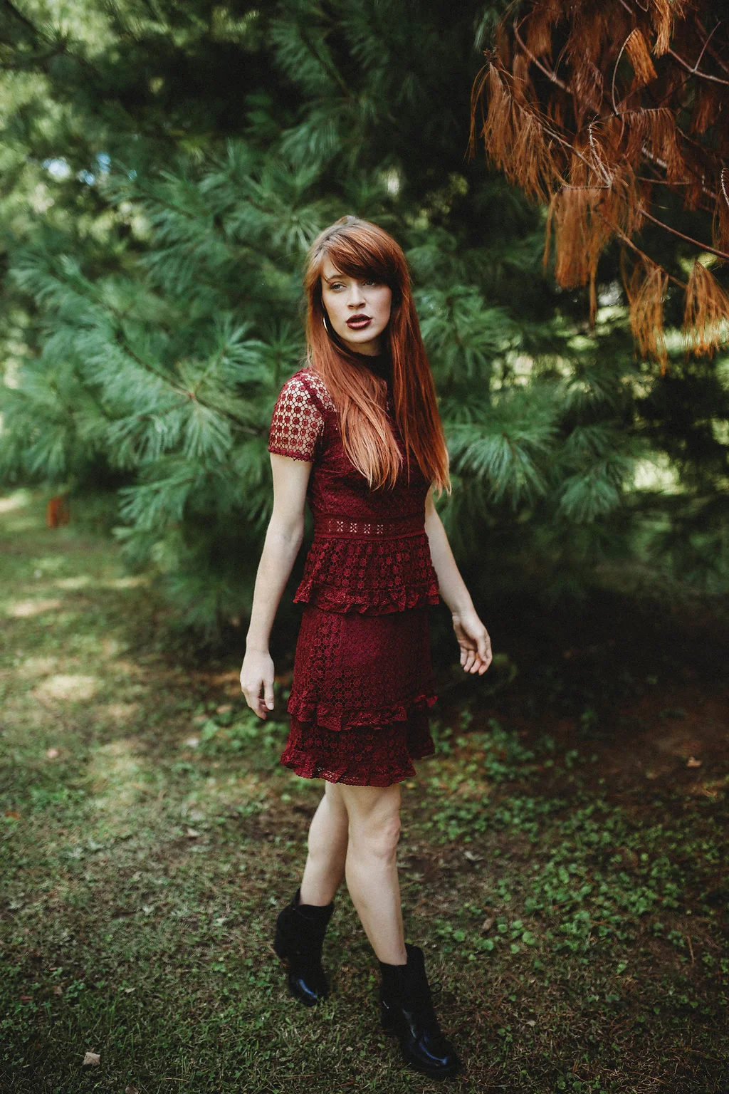 This beautiful spot is in a small park located behind the Old Mill and Depot near Main Street. It has a small playground and walking area. It’s perfect for families to spend their day, kids can play on the old Caboose, and is also close to our newly-built public library. Get the look at Morgan's on Main: Burgundy Lace Peplum Dress ($40) | Black Heeled Combat Boots ($42) Morgan Ships! shop her Facebook and IG 