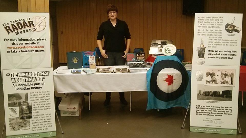 Manager Maya poses with the display before heading back outside for the ceremony at the Cenotaph. November 11, 2015