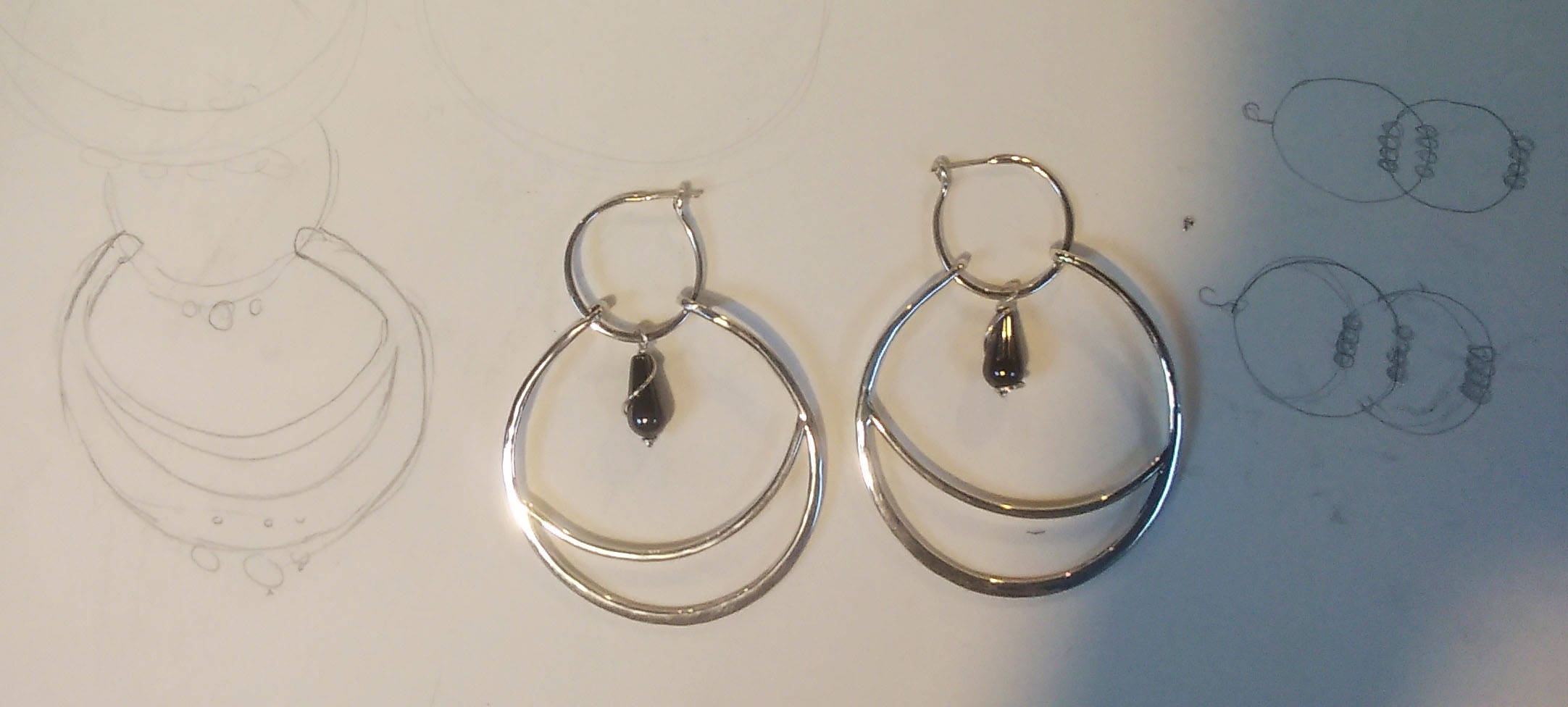 Silver hoops made by first time silver smithing student.