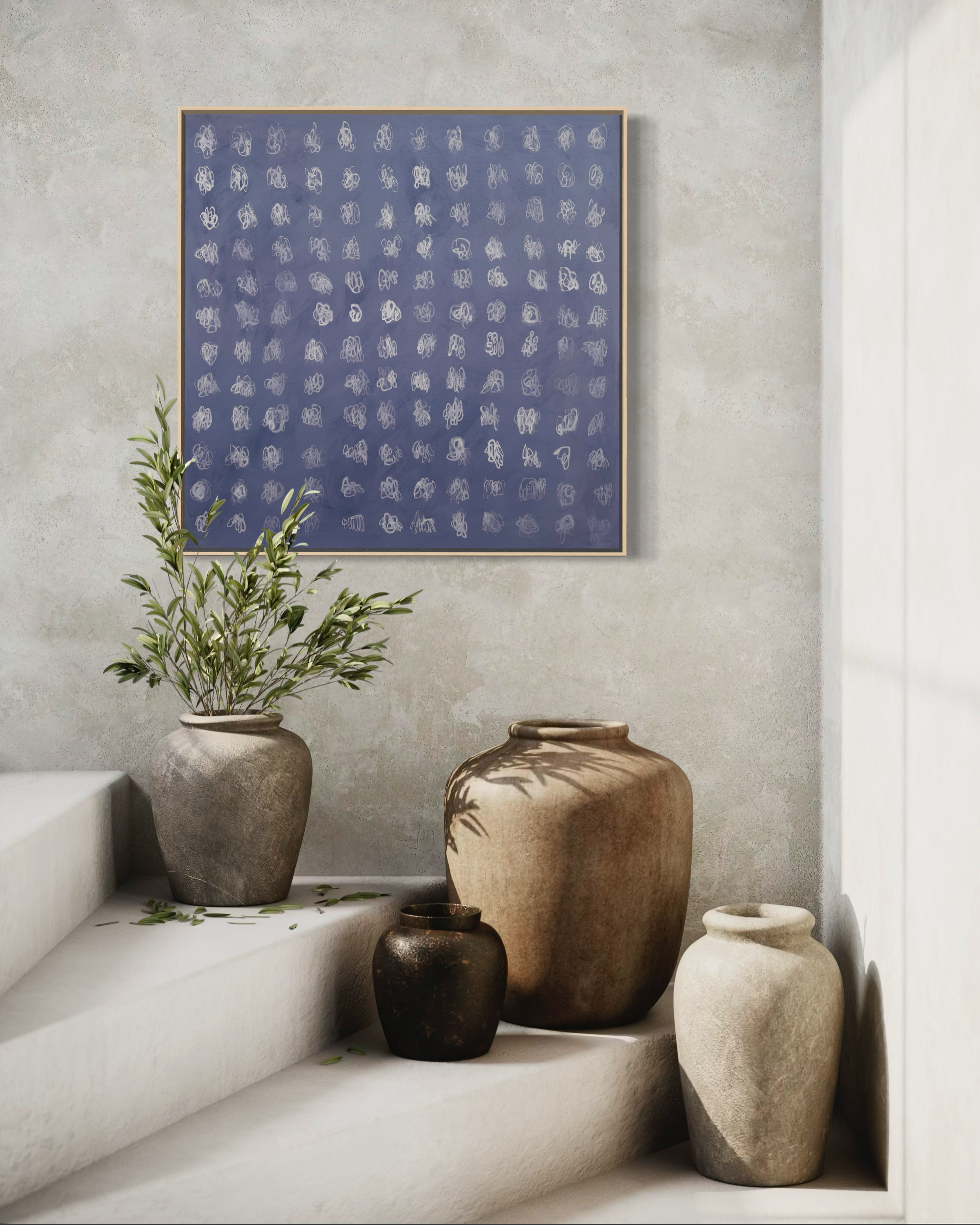 Meditative painting, soft blue background with white soft marks marking moments of breath in white. Shown hanging elegantly on a wall, of a modern stairwell with planters and olive leaves.