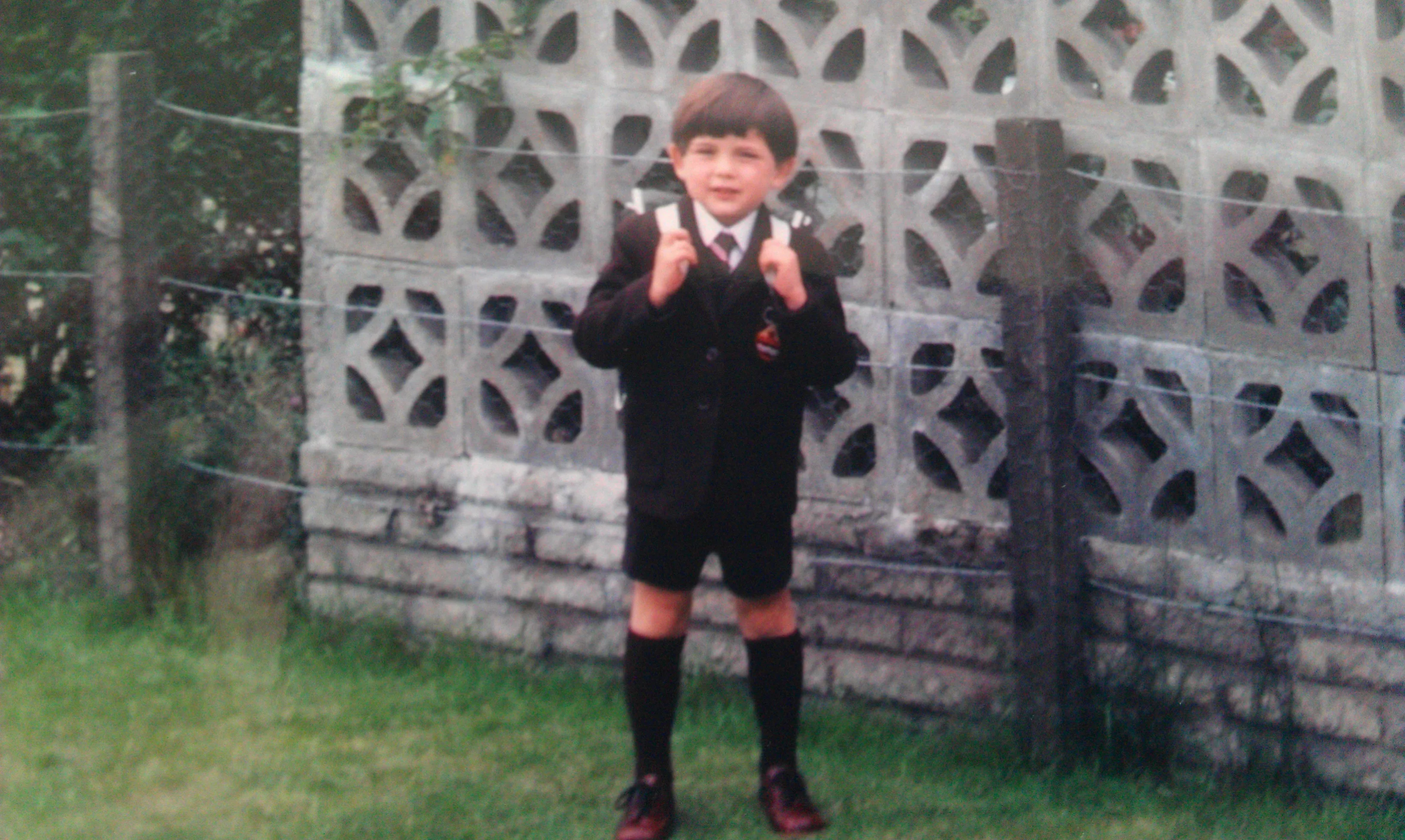 Clive, when he was a whole lot younger, posing on his first day of school in Clydebank, Scotland.