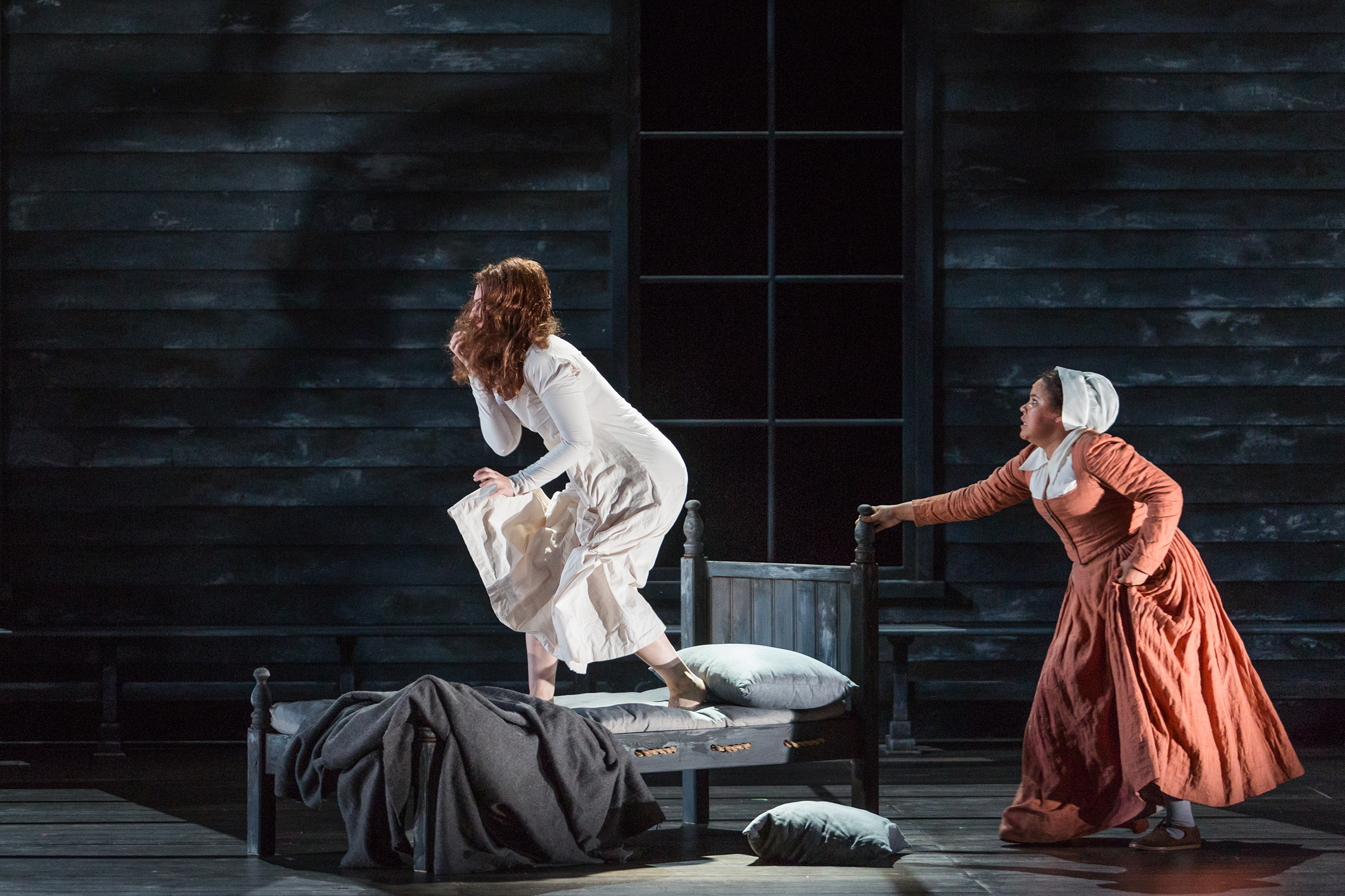  Mary Beth Nelson as Betty Parris and Ariana Wehr as Abigail Williams in The Glimmerglass Festival's production of Robert Ward's  The Crucible . 