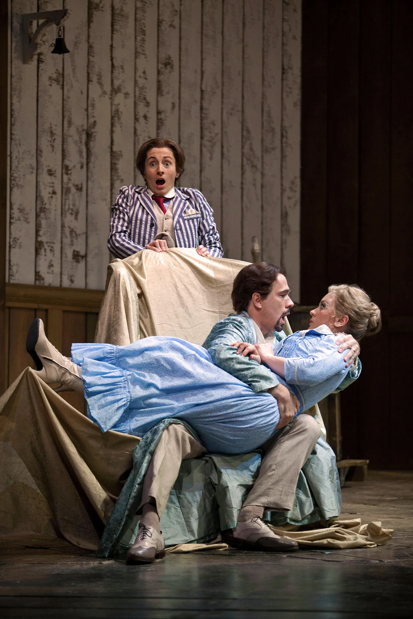 Aurhelia Varak as Cherubino, Mark Schnaible as the Count and Lyubov Petrova as Susanna in the Glimmerglass Opera 2010 production of The Marriage of Figaro .