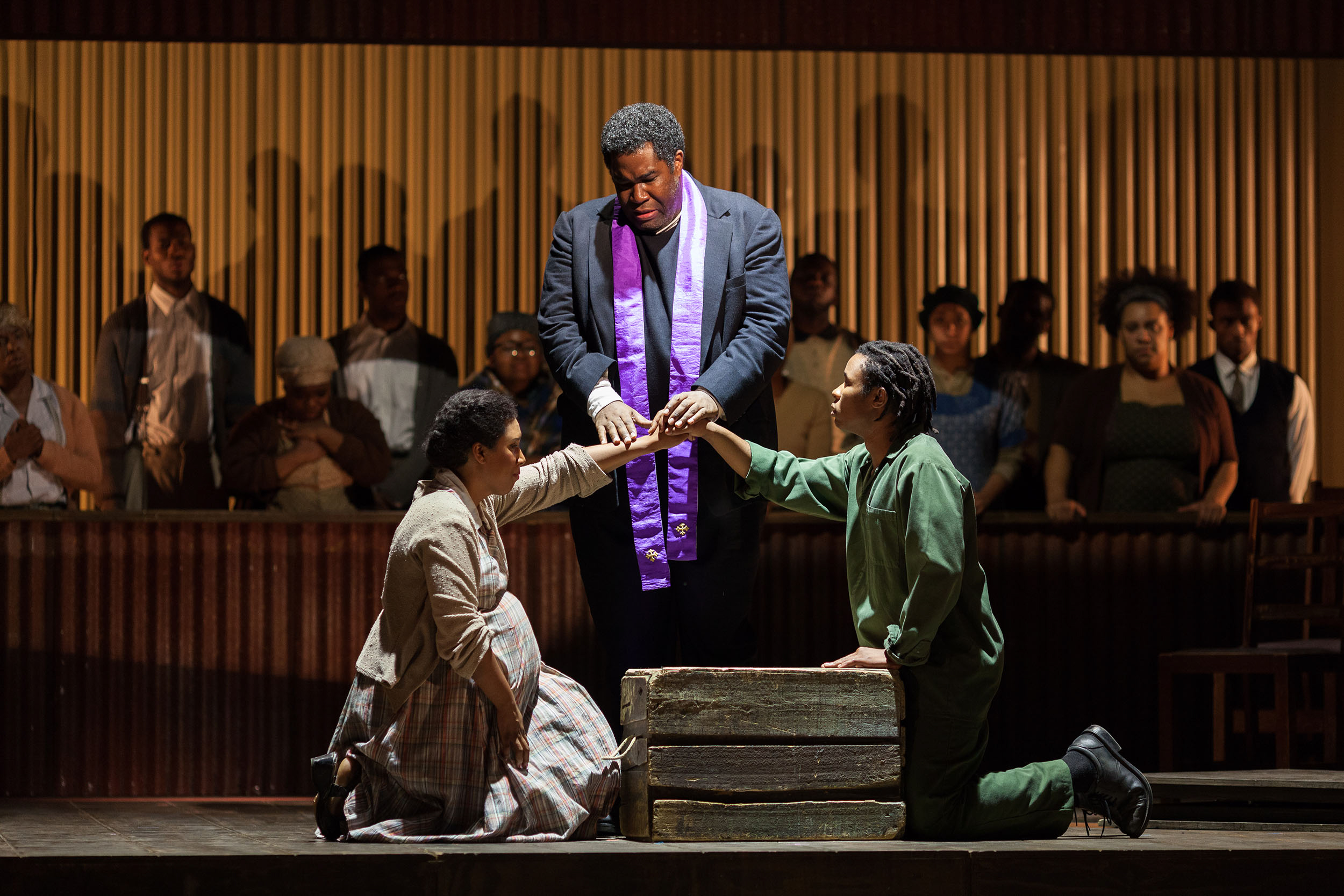  L to R: Brandy Lynn Hawkins as Irina, Eric Owens as Stephen Kumalo and Makudupanyane Senaoana as Absalom in The Glimmerglass Festival's production of Kurt Weill and Maxwell Anderson's  Lost in the Stars . 