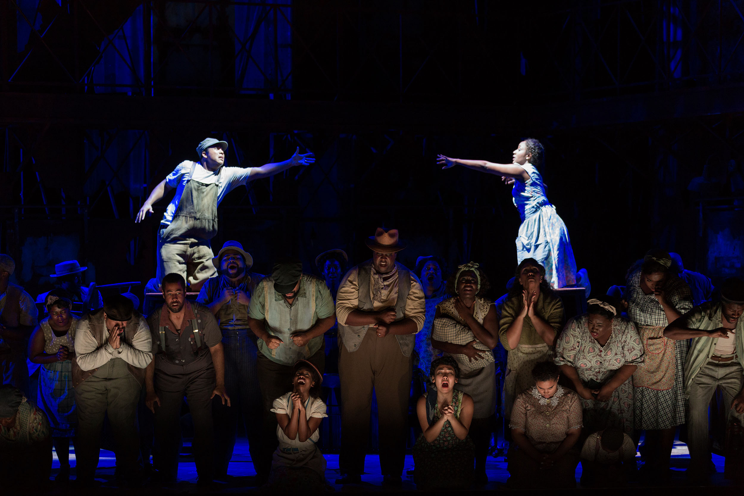  L to R: Justin Austin as Jake and Meroë Khalia Adeeb as Clara and members of the ensemble in The Glimmerglass Festival's 2017 production of The Gershwins'  Porgy and Bess . 