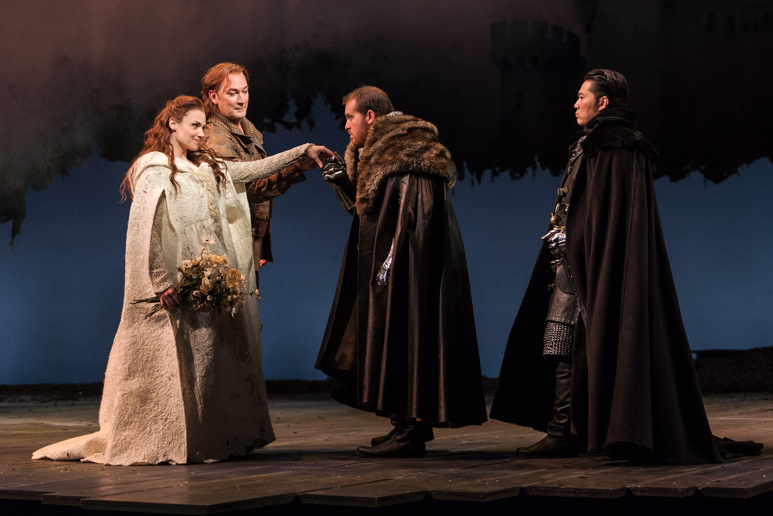 L to R: Andriana Chuchman, David Pittsinger as King Arthur, Clay Hilley as Sir Dinaden and Wayne Hu as Sir Sagramore in The Glimmerglass Festival production of  Camelot . 