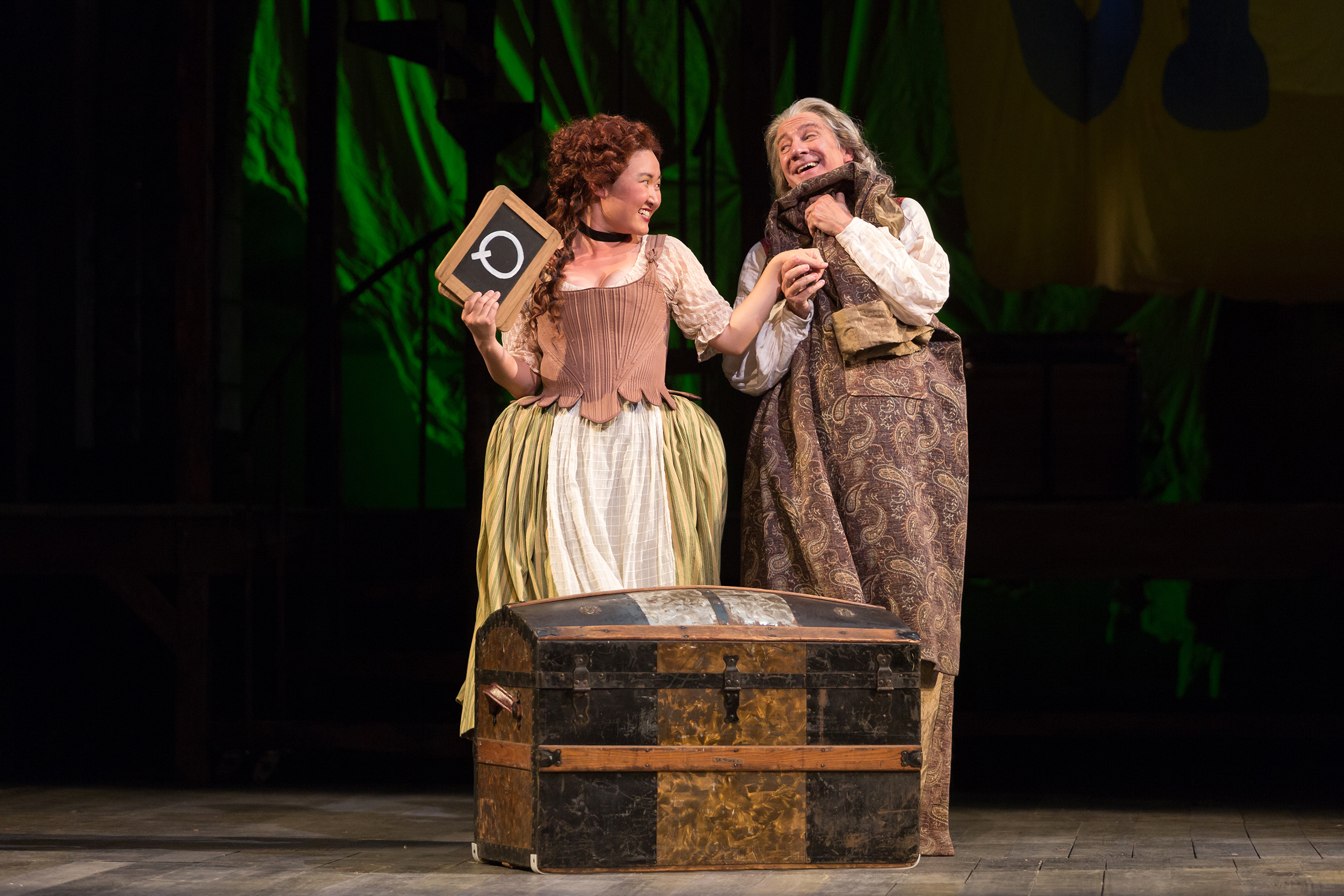  Kristen Choi as Paquette and David Garrison as Pangloss in The Glimmerglass Festival production of Bernstein's  Candide . 