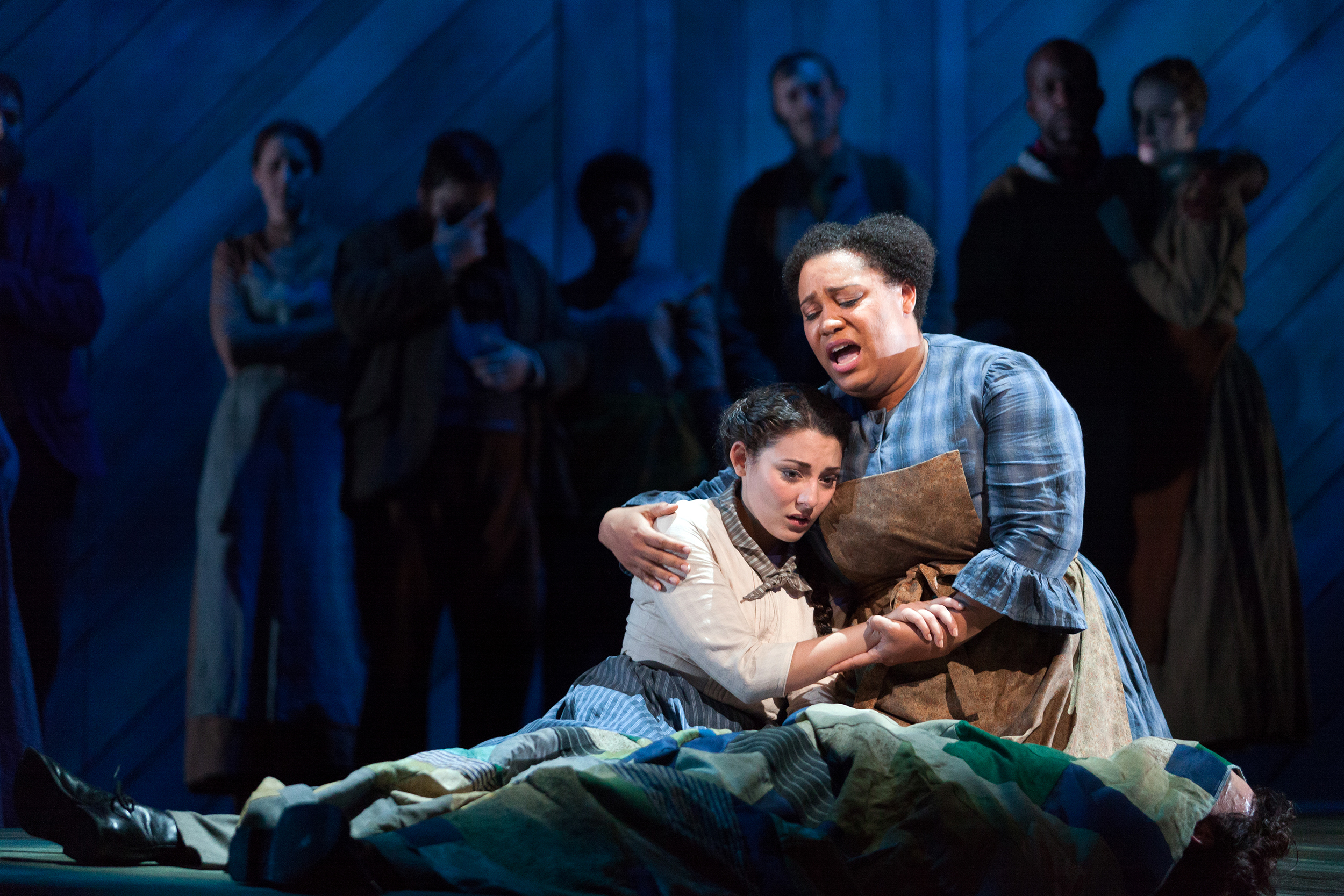  Andrea Carroll as Julie Jordan and Deborah Nansteel as Nettie Fowler in The Glimmerglass Festival's 2014 production of Rodgers and Hammerstein's  Carousel . 