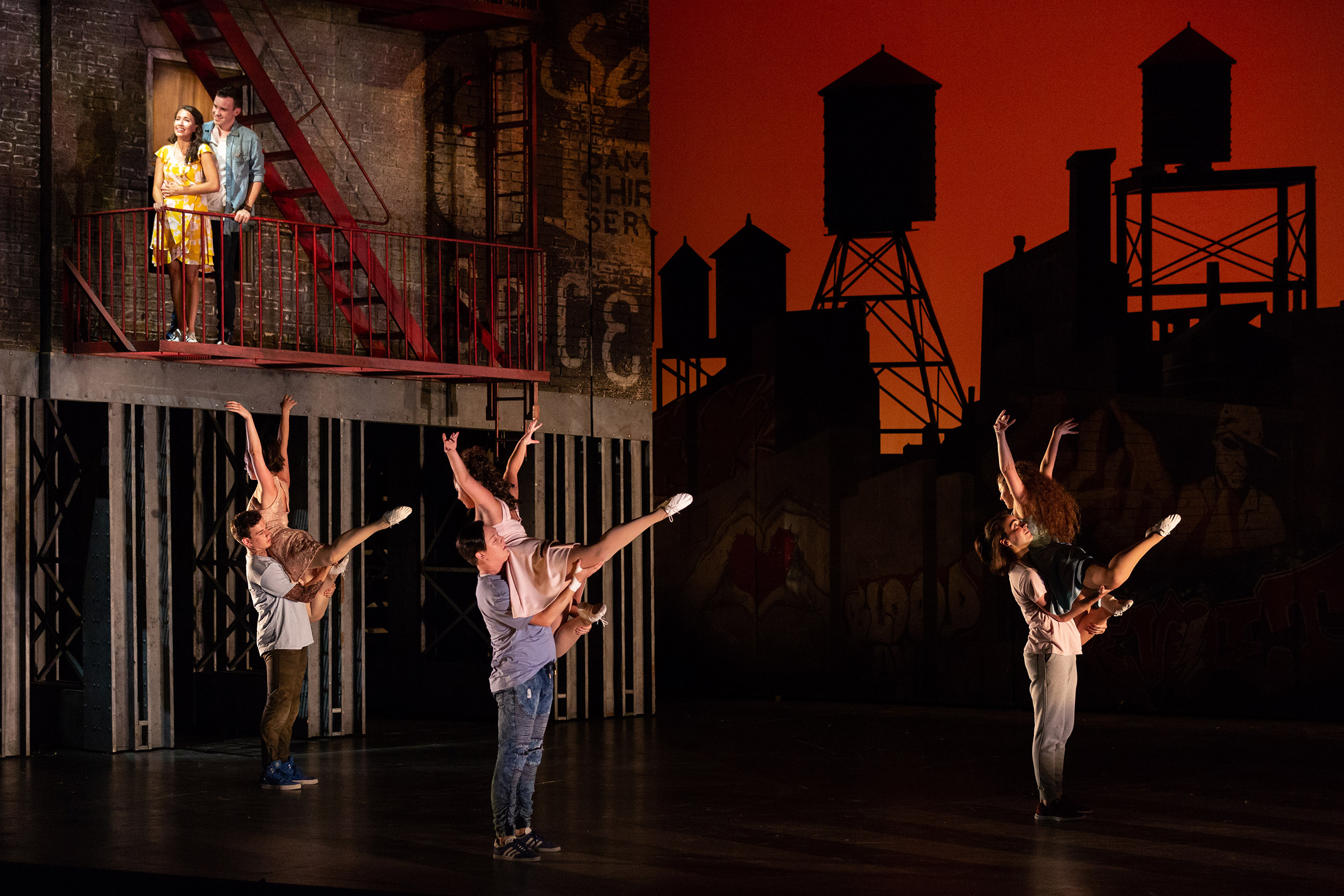  Vanessa Becerra as Maria and Joseph Leppek as Tony with members of the ensemble in The Glimmerglass Festival's 2018 production of Bernstein's  West Side Story . 