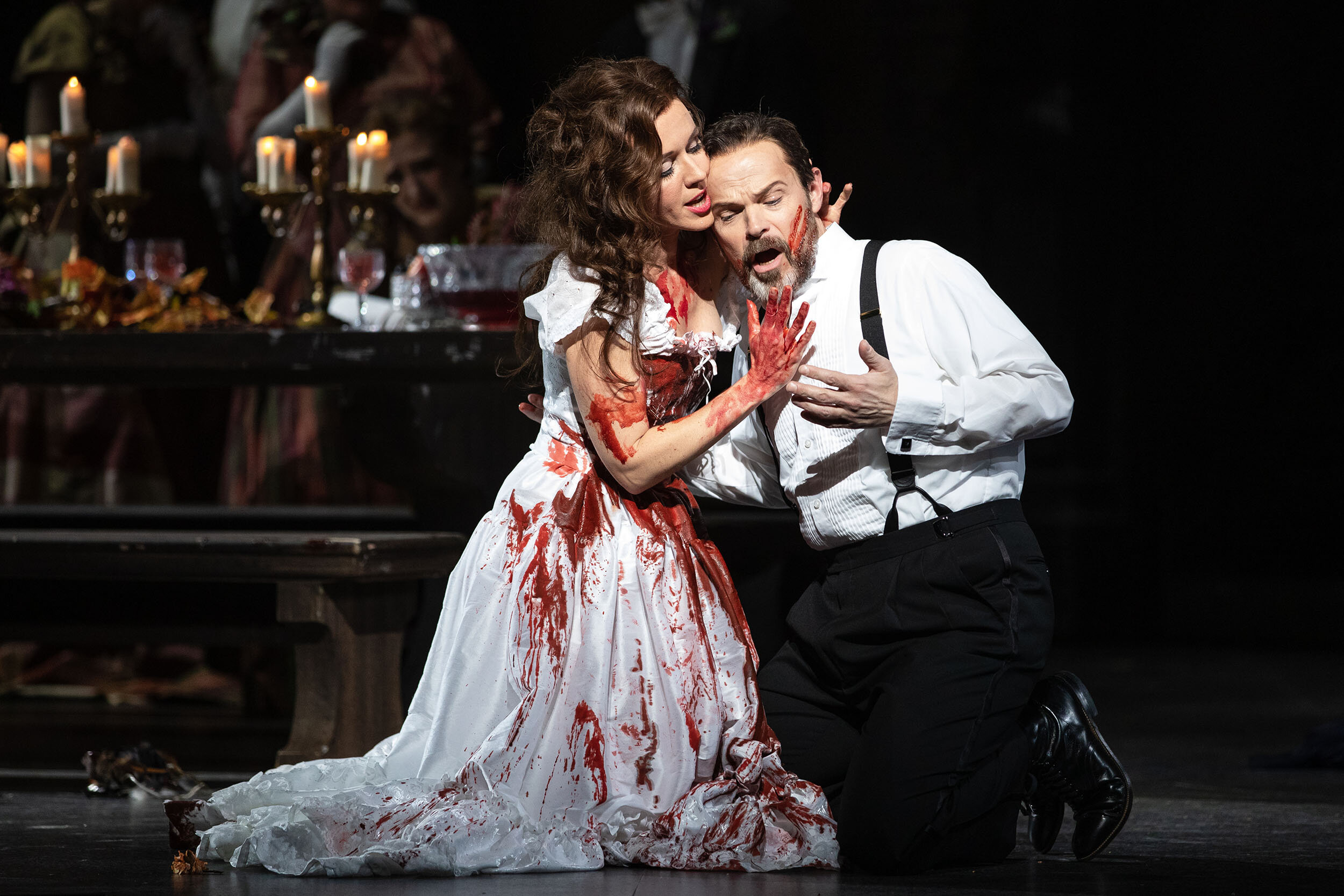  Soprano Sarah Coburn as Lucia and Baritone Troy Cook as Enrico in the 2020 Lyric Opera of Kansas City production of  Lucia di Lammermoor . 