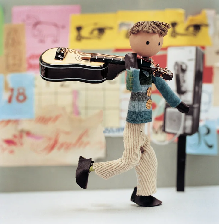 SUNNYWITHGUITAR.jpg