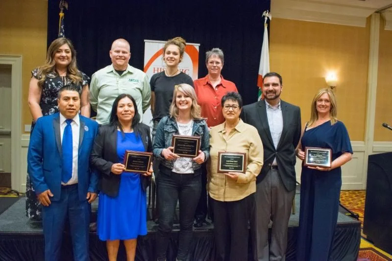 Congratulations to this year's award recipients at the 7th annual Kern County Small Business Week Luncheon & Awards on May 2nd at the Bakersfield Marriott. Pictured above, front row - left to right: Geronimo Atriano and Natalia Atriano "Business of the Year - Atriano's Cleaners", Samantha Johnson "Rising Star Business of the Year" - Johnny's Take and Bake Pizza, Lydia Chaney "Family Owned Business of the Year" - South Street Digital, Eric Horn - South Street Digital, Cami Hogg "Energy Service Business of the Year" - 5C Holding Inc. Drilling and Transportation. Back row - left to right: Leticia Garza Velasquez "Woman Owned Business of the Year" - Mix Salon and Touch Up Bar, John Heath "Technology Business of the Year" - Alpha Technologies & Alarm System, Amy Langston - Johnny's Take and Bake Pizza, Audrey Post - South Street Digital.