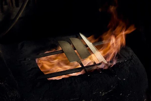 Knives being smithed at Kejiro Doi's blacksmith shop in Sakai, Japan