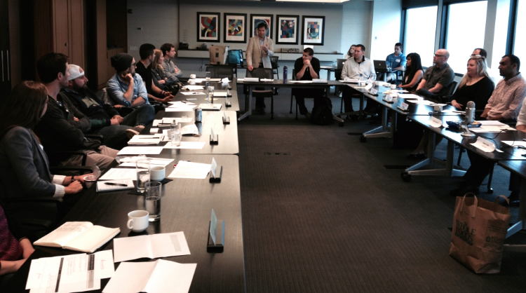 Brian Burkhart (standing) during the JuntoClass on Leadership Communications