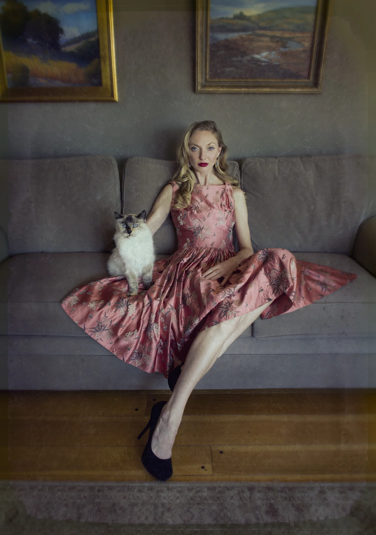 Tiana and Muffin on the sofa.