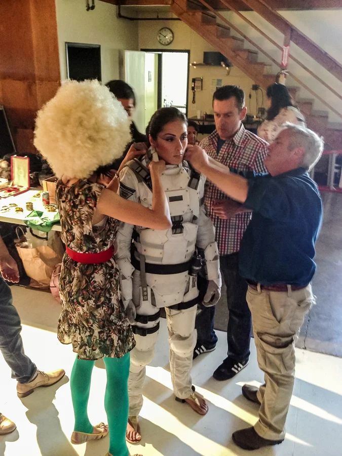 Everyone lends a hand when fitting talent in storm trooper body armor