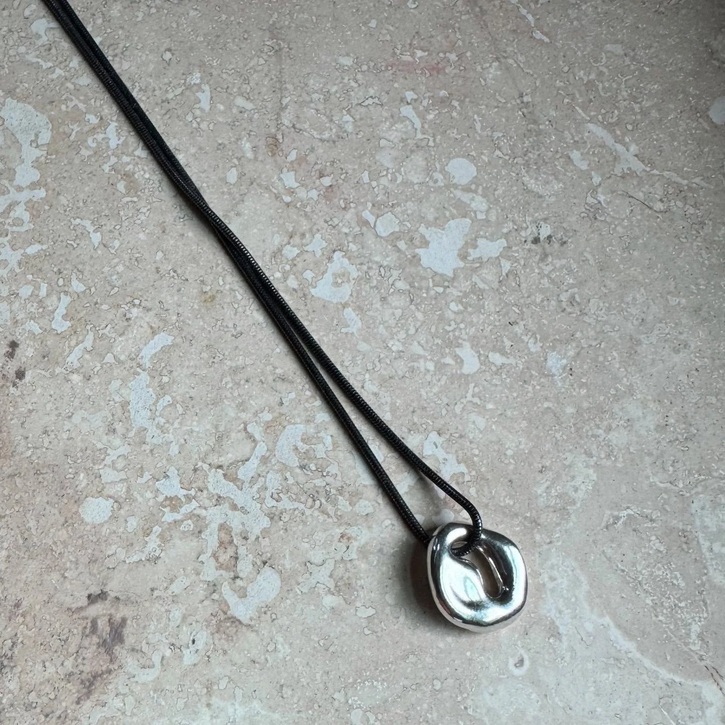 same pendant, new chain 🖤
.
.
.
.
.
#austinjewelry #handmadejewelry #austindesigner #slanttstudio #artjewelry #sterlingsilver