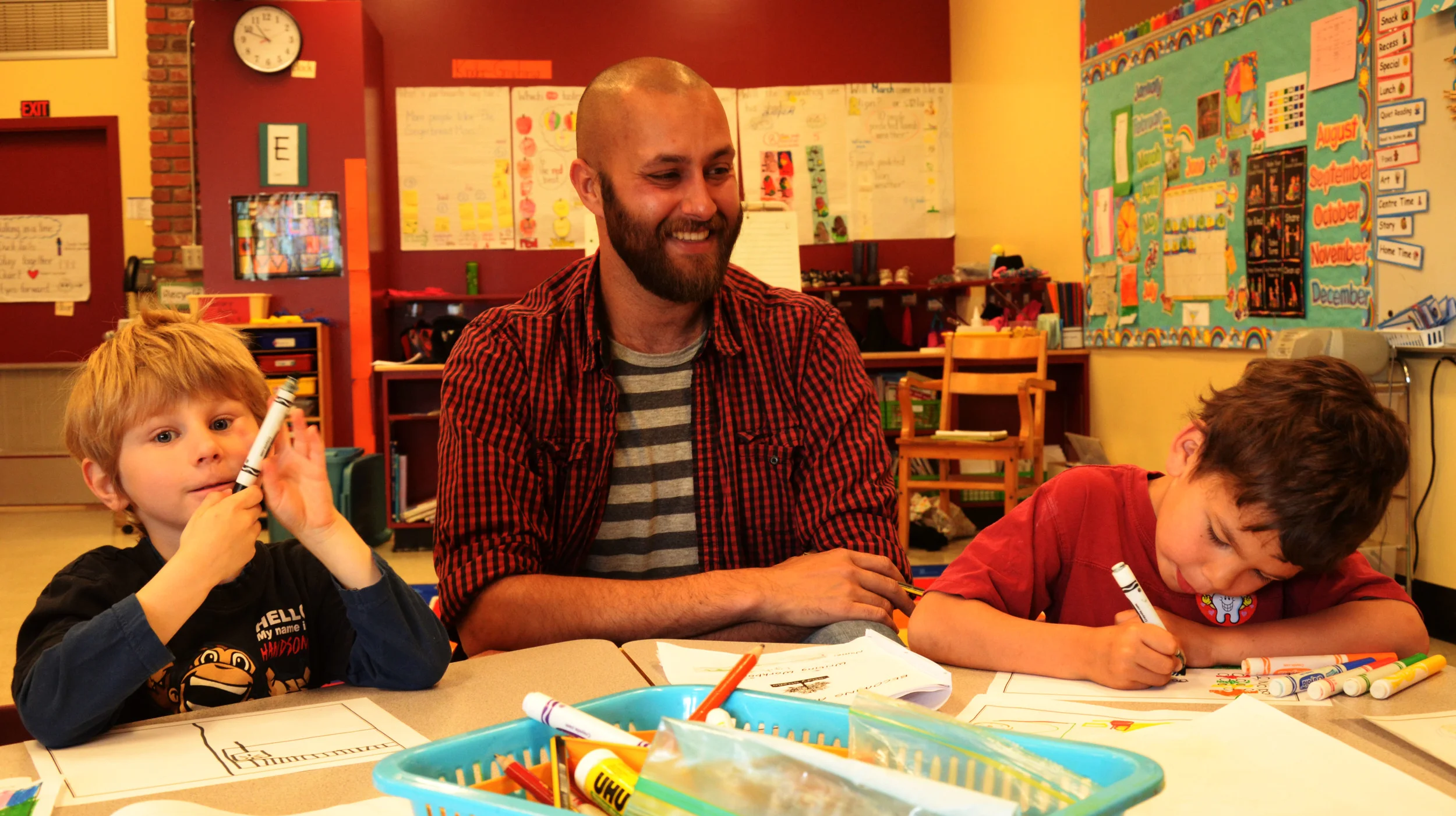 Matt beg FriesenPress Publishing Consultant with kids trying to help them tell stories with Story Studio.JPG