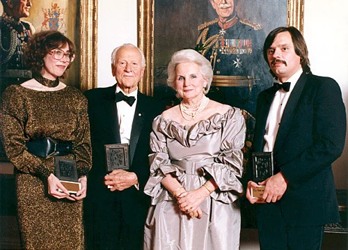 Co-Winners of the 1985 Michener Award. Left to Right: Olivia Ward, reporter Toronto Star; former governor general Roland Michener; Governor General Jean Sauvé; Victor Malarek, the reporter, the Globe and Mail.