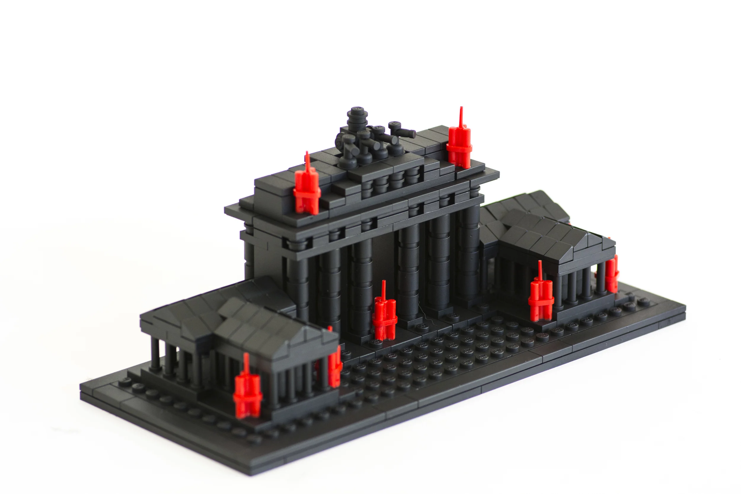 Anti-Monuments for Counter Histories (09/12/1987) , painted lego pieces and plastic dynamite, 3.6" (9.2cm) tall, 8.8" (22.4cm) wide and 3.7" (9.6cm) deep, 2015