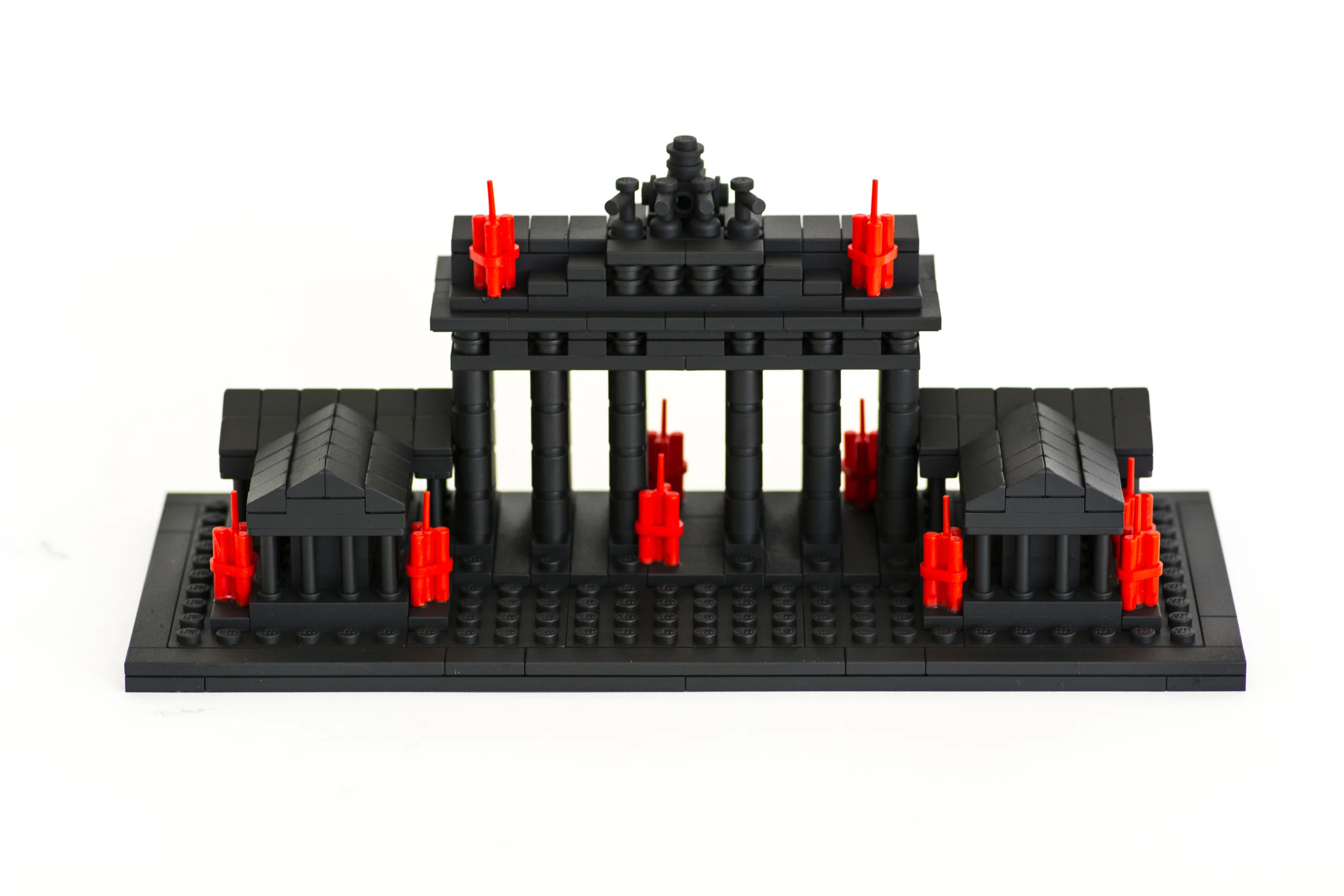 Anti-Monuments for Counter Histories (09/12/1987) , painted lego pieces and plastic dynamite, 3.6" (9.2cm) tall, 8.8" (22.4cm) wide and 3.7" (9.6cm) deep, 2015