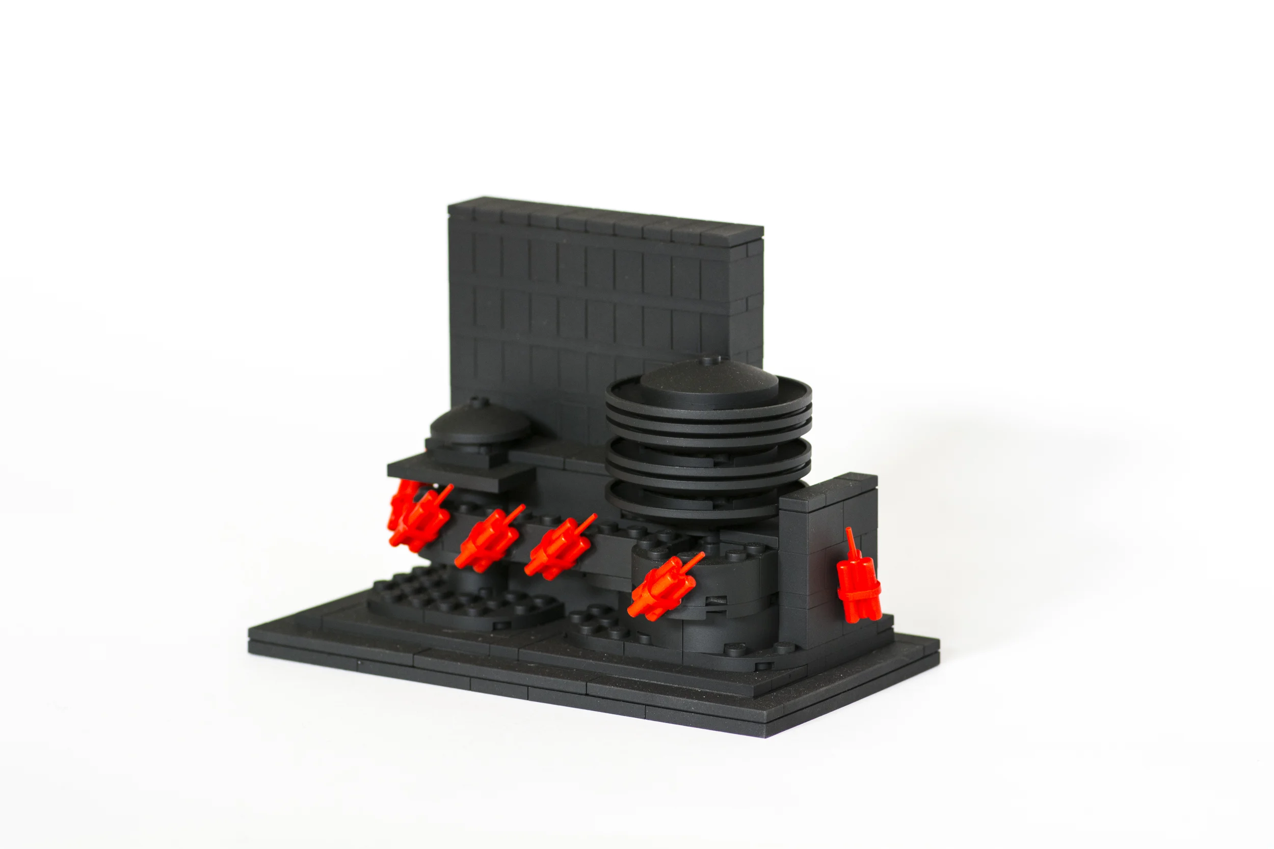 Anti-Monuments for Counter Histories (02/20/1909) , painted lego pieces and plastic dynamite, 2015