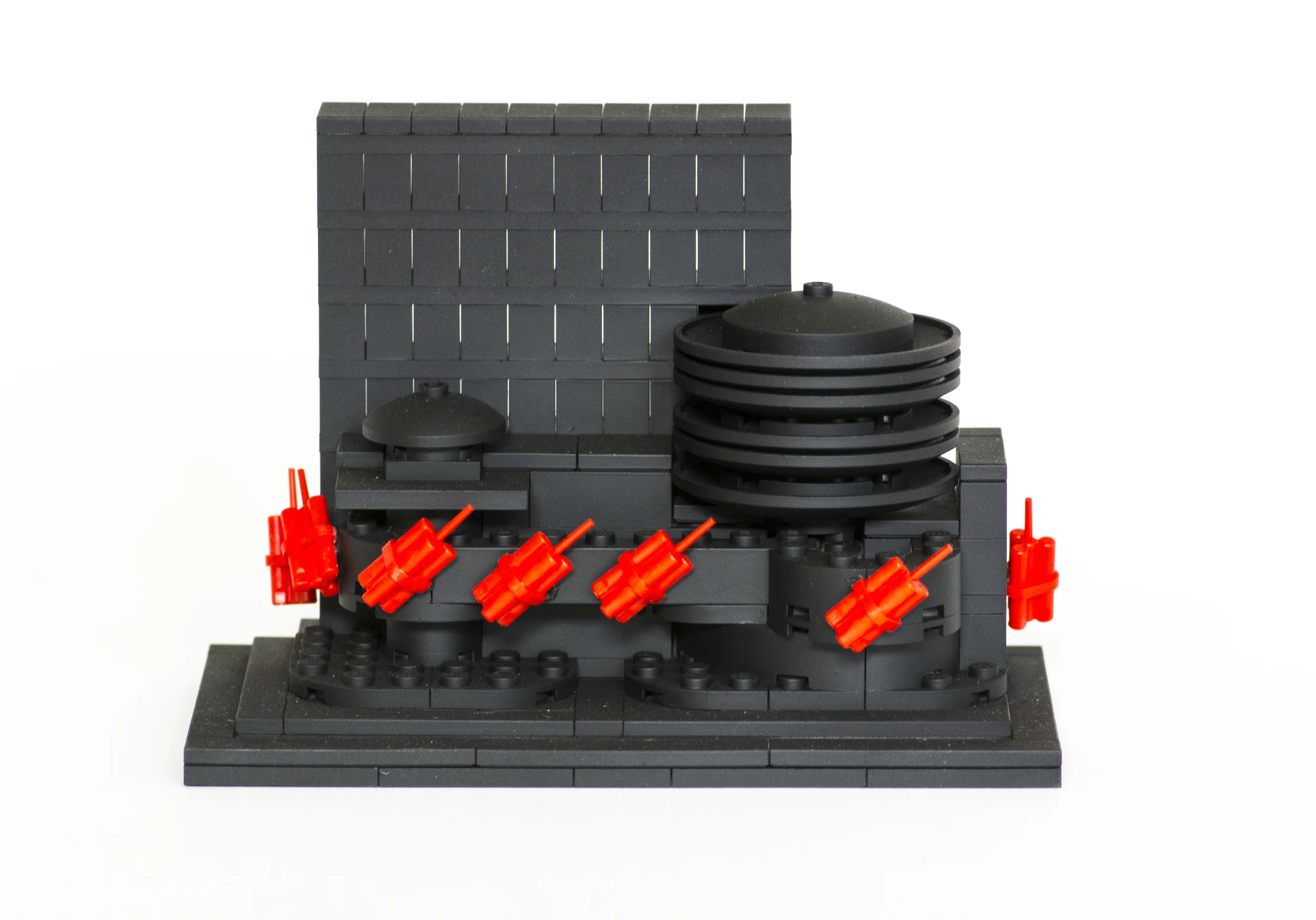 Anti-Monuments for Counter Histories (02/20/1909) , painted lego pieces and plastic dynamite, 2015