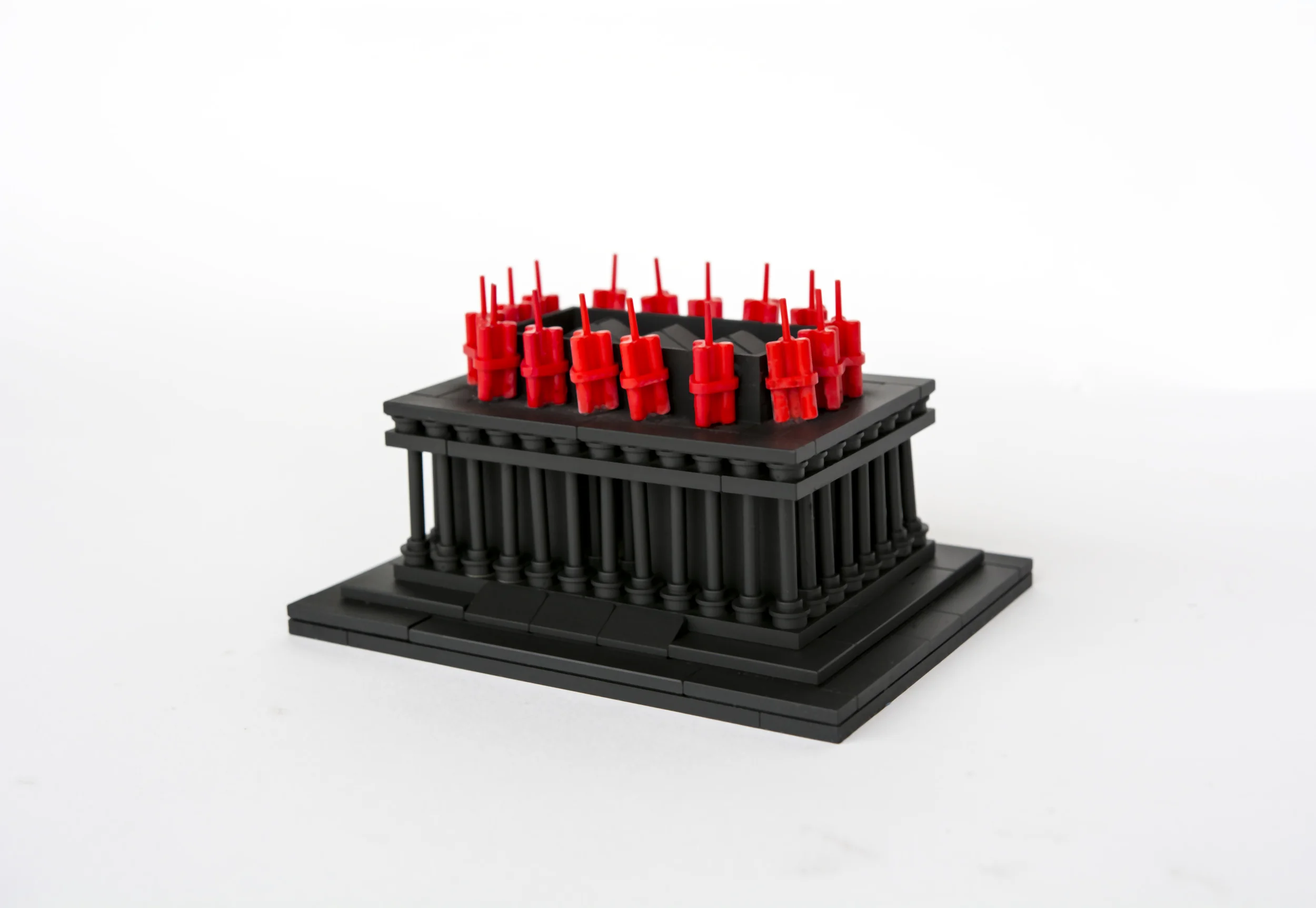 Anti-Monuments for Counter Histories (09/05/1970) , painted lego pieces and plastic dynamite, 2" (6cm) tall, 4" (12cm) wide and 3" (9cm) deep, 2015