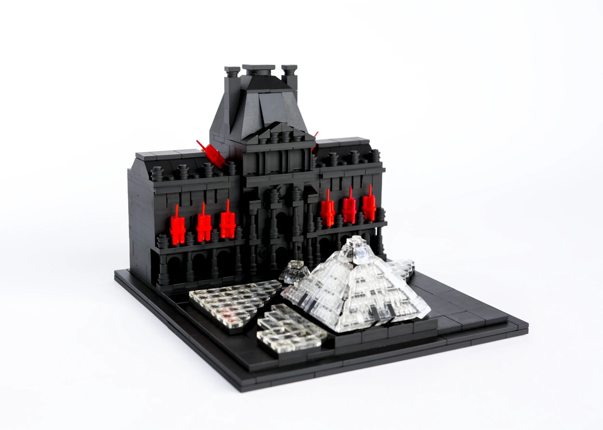 Anti-Monuments for Counter Histories (03/29/1998) , painted lego pieces and plastic dynamite, 5" (13cm) tall, 6" (17cm) wide and 7" (19cm) deep, 2015