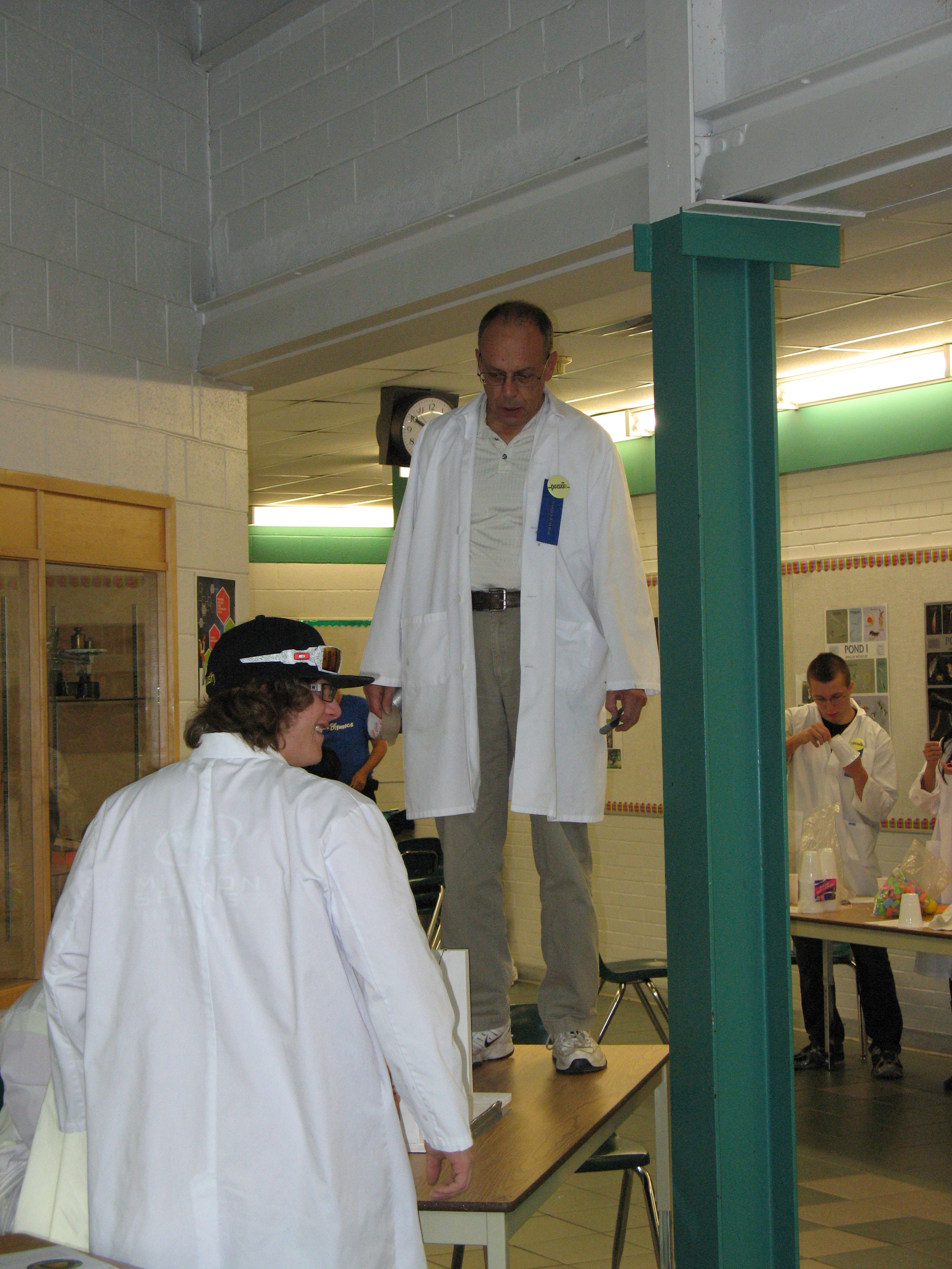 Clem demonstrating an earthquake at the 2011 Family Science Olympics.