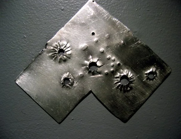 one of Tyeakia Miles small wall sculptures.jpg