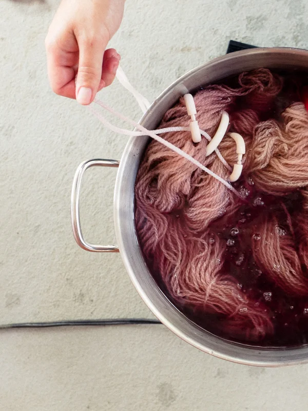 Adding yarn.