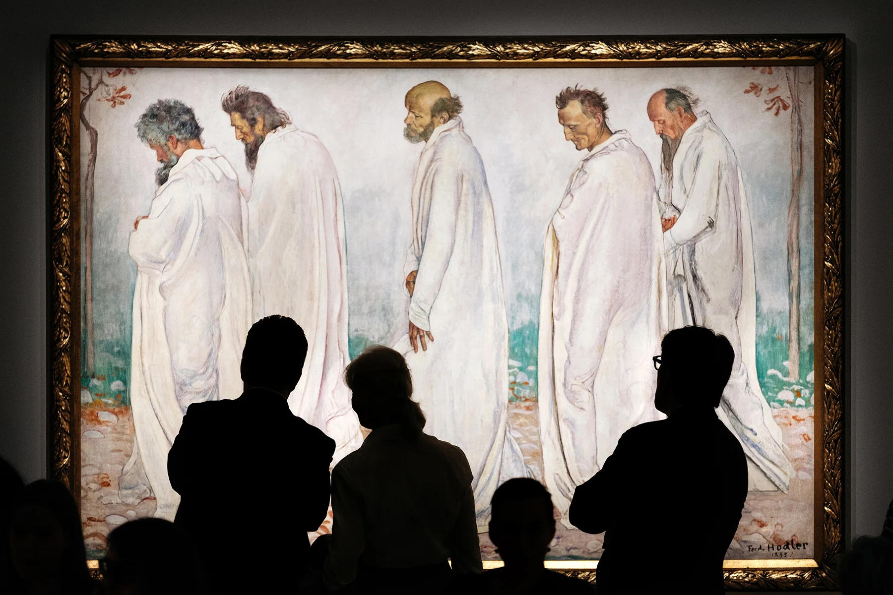 Visitors in front of Ferdinand Hodler painting “Eurythmie” on display at the Rath museum in Geneva during the Hodler Parallelism temporary exhibition.