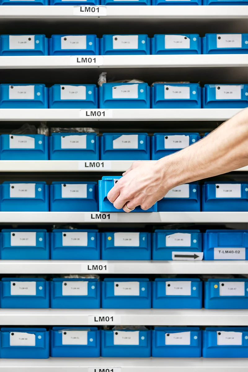 Components of watches and machines are organized in blue boxes, each one contains all the elements required to assemble the timepiece.