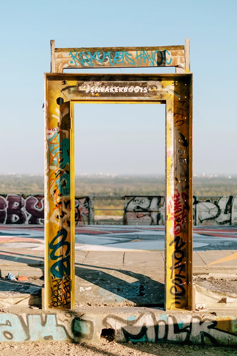 A door leading to nowhere at the top of Teufelsberg radar site.