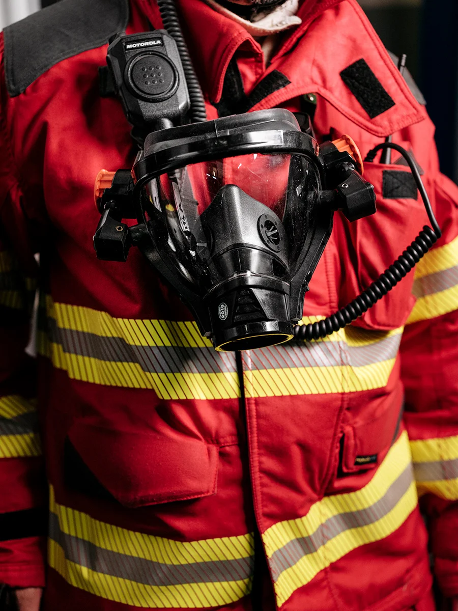 Detail of Rudy Fassin direct response crew (professional firefighters) gear in the hangar on the French side.