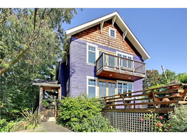 Beautiful Mountain & Sound views set the stage for this studs-out craftsman-style remodel in 2000. With over 3000 sqft, 3 bedrooms on the upper level including master suite w/stunning views & balcony, office, & 2.5 baths this home has it all! The main level boasts wood floors, spacious living rm w/fireplace & access to the entertainment deck, dining rm, family rm, plus top of the line appliances in the cooks-kitchen w/concrete counters & eating nook. Tons of storage, great yard & 2 car garage.