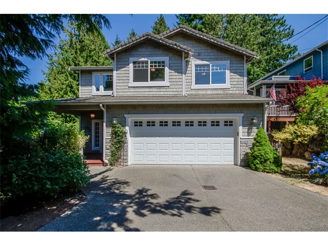 Welcome to your new home next to Fauntleroy Park! Located on a private street this home feels like a retreat with its Gazebo and hot tub, breakfast bar, jetted tub, 2 decks, fireplace and an outdoor bar for entertaining, with your completely private yard. Great neighbors with lots to love in this home. Unique low maintenance landscaping & wired inside & out with high quality audio. Vaulted ceilings with an open floor plan, huge master suite and so much more. This custom home is not to be missed.
