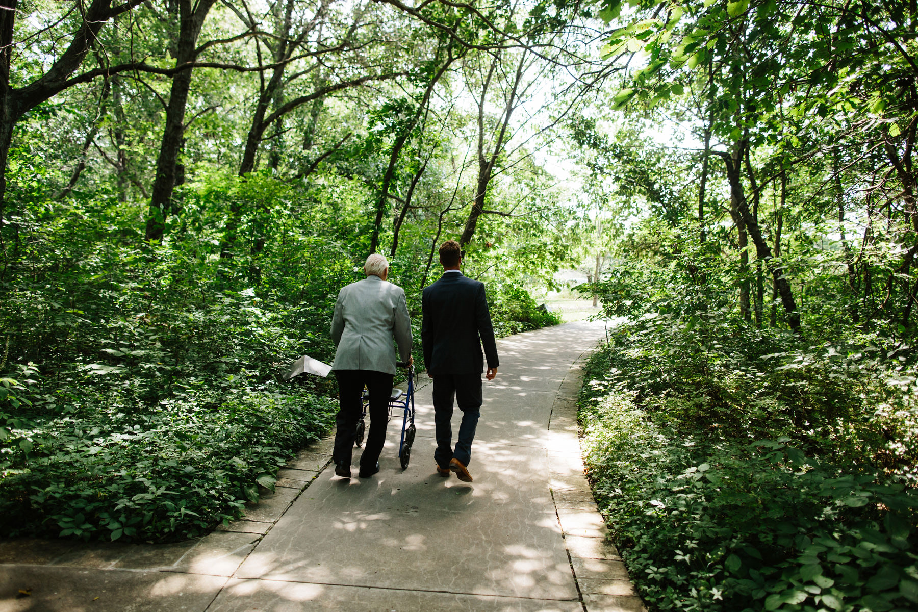 Jordan and Josh's Powell Garden's Chapel Elopement followed by an intimate reception at The Westside Local in Kansas city Missouri. Kindling Wedding Photography and Videography. Kansas City based wedding photographers available for travel and destination weddings.