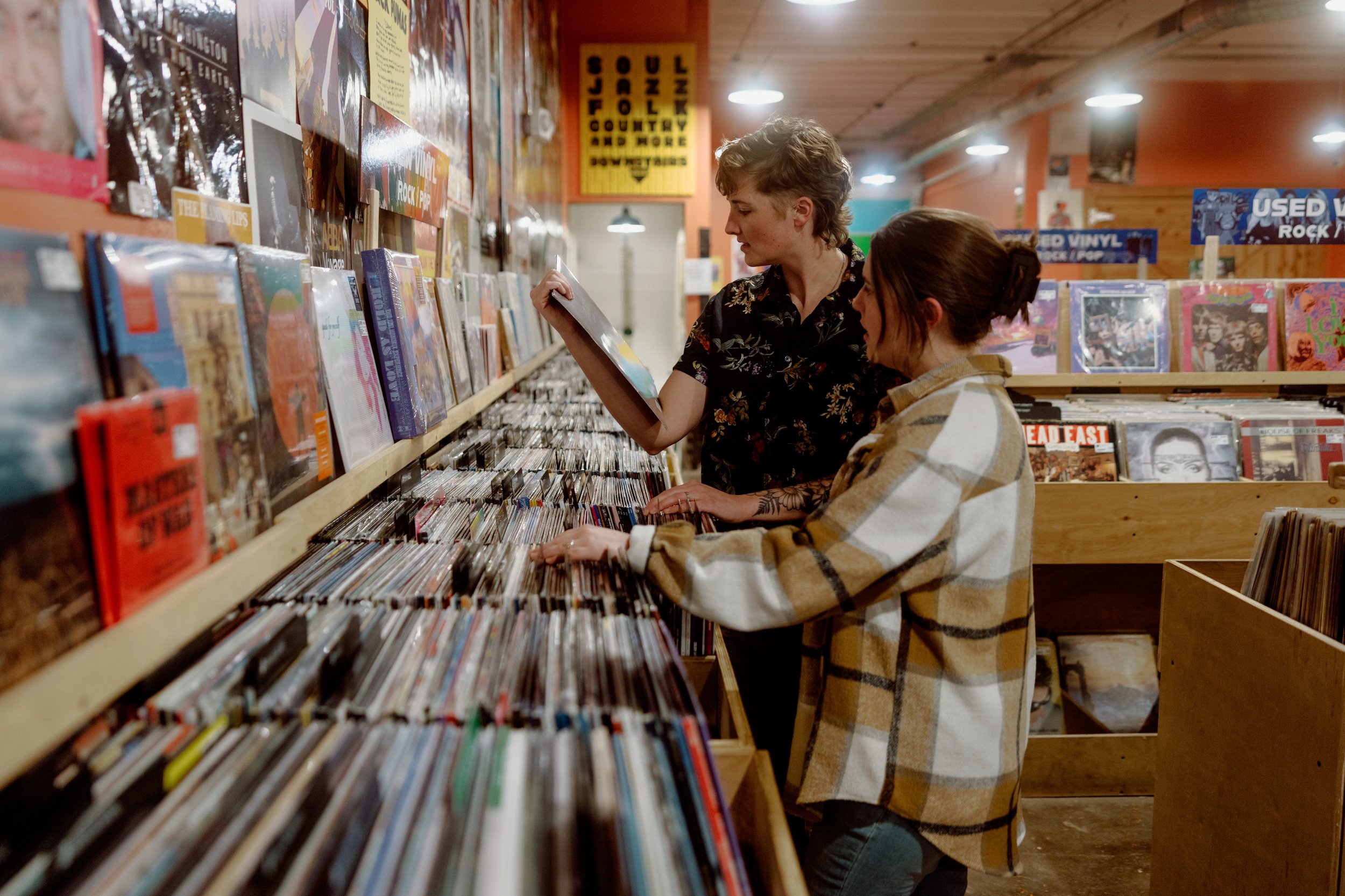 Bar and record store engagment photography queer couple_kansas city wedding photography_284.JPG