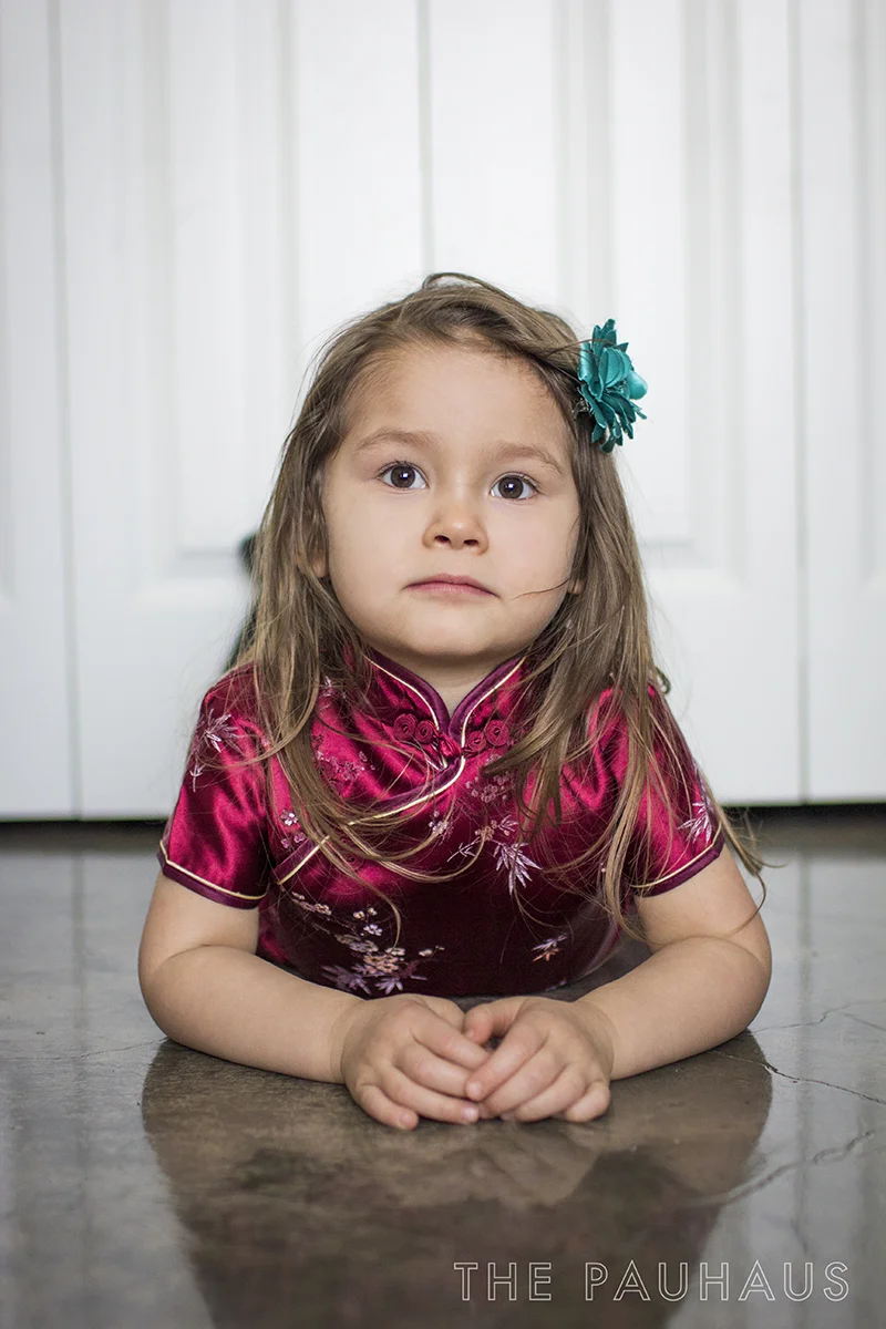 Little Chloe in her first cheongsam. 