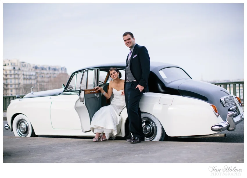 bride and groom in vintage rolls royce