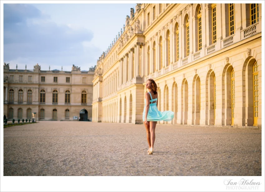 beautiful girl in front of versailles