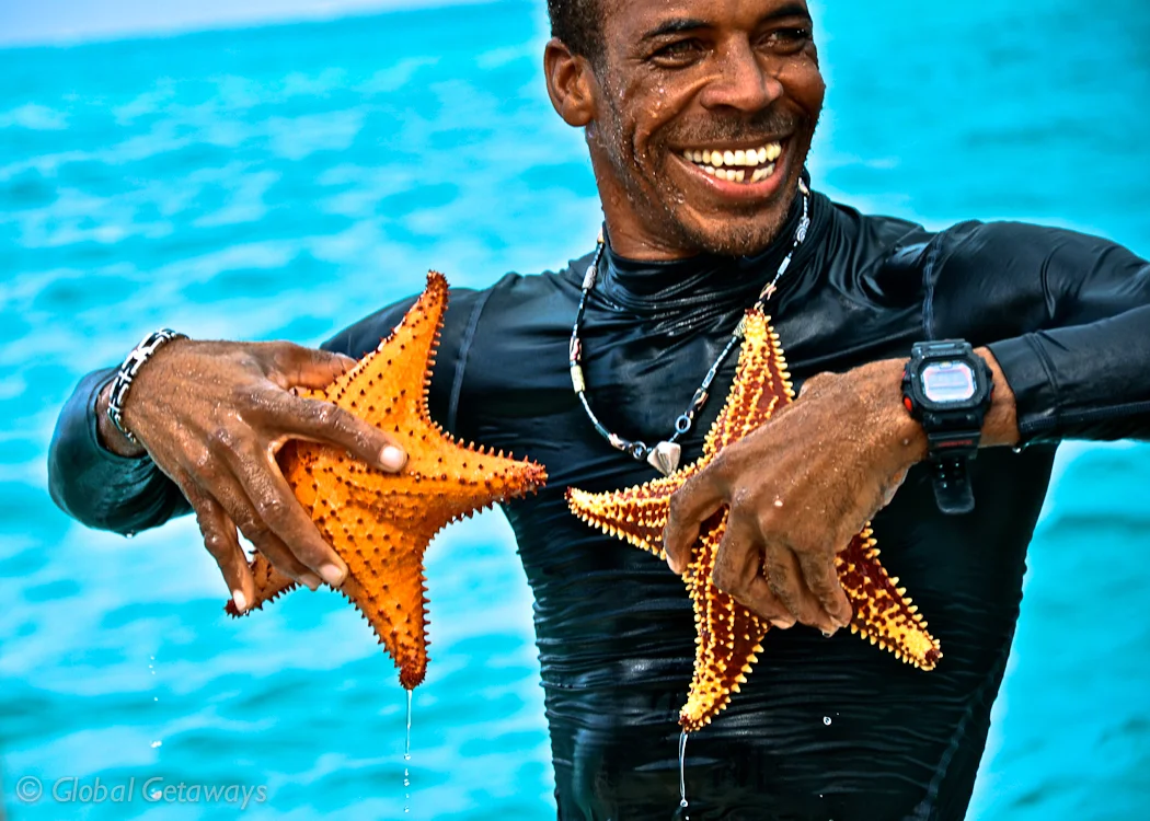 Diving into the ocean after swimming with the Sting Rays, our Captain finds these!