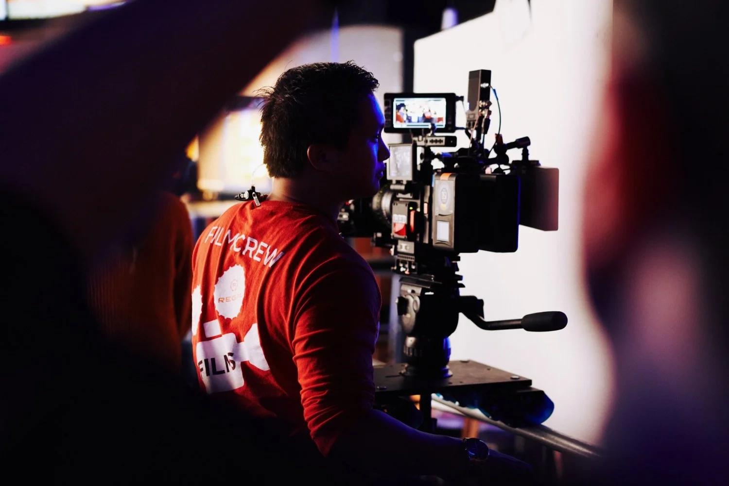 Director of photography filming a commercial with a RED Digital Cinema Camera.