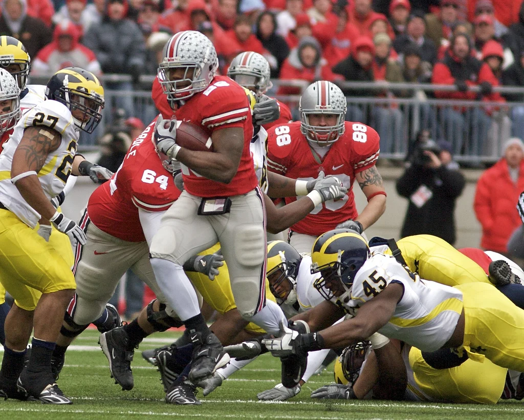 Beanie Wells escapes the grasp of Michigan linebacker Obi Ezeh to score on a 59 yard run. Photo courtesy @photogoofer
