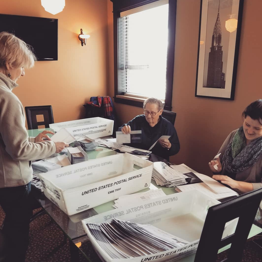 Volunteers help with our office mailing (2018).