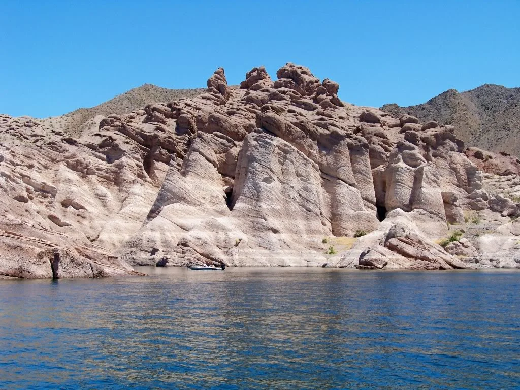 Boat providing scale Castle Cove