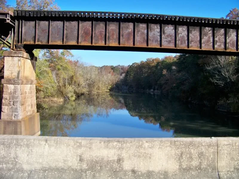 Railroad bridge spanning Little Bear Creek as seen from Highway 72