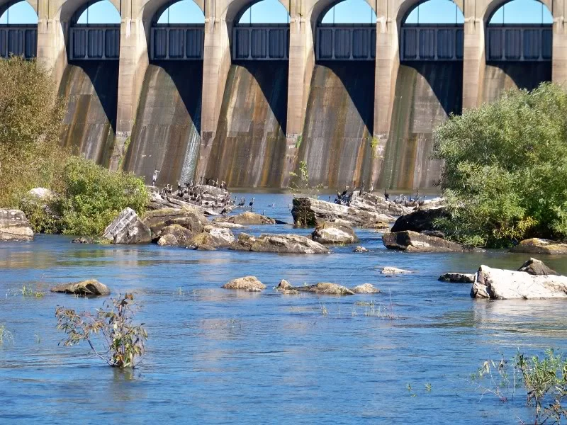 Wilson Dam structure beyond downstream boulders